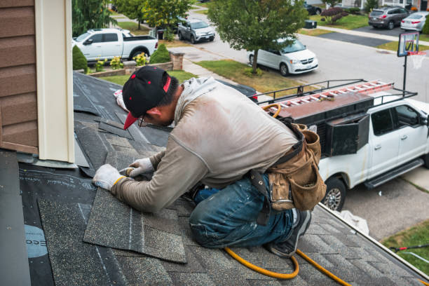 Professional Roofing technician working in Omena, MI
